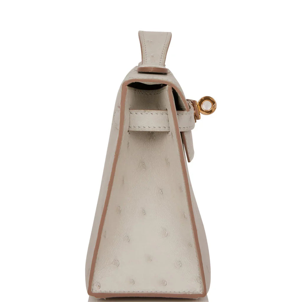Pearl Gray Ostrich Leather Mini Flap Clutch With Glossy Gold Turn Lock and Slim Flat Top Handle