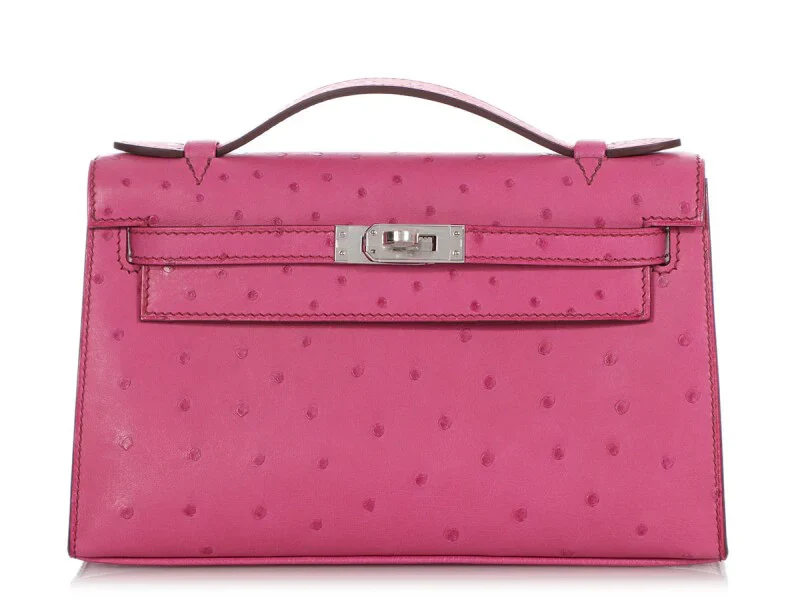 Fuchsia Ostrich Leather Mini Flap Handbag With Silver Turn Lock and Short Rolled Top Handle