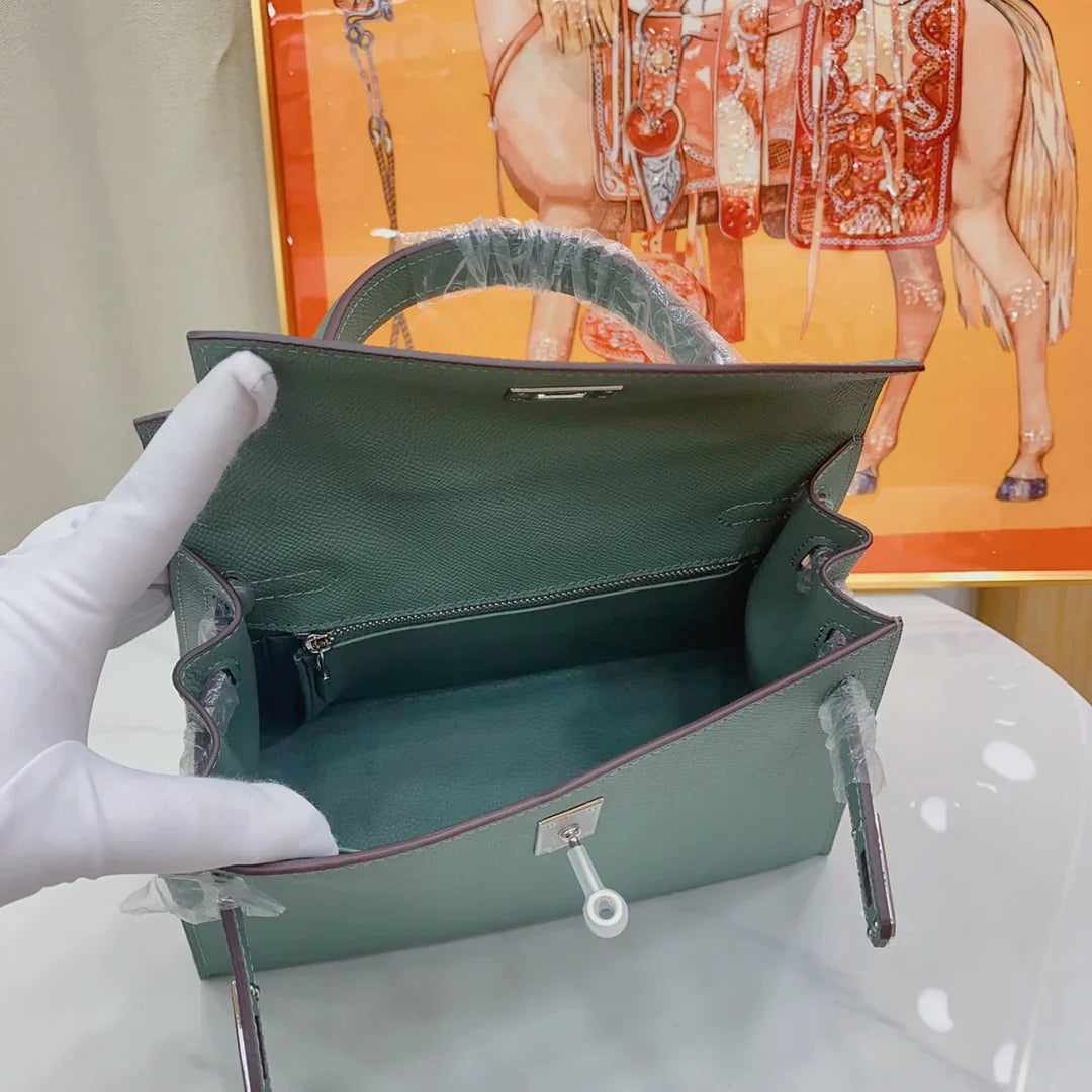 Almond Dark Green Mini Flip Handbag With Silver Turn Lock, Black Top Handle & Detachable Shoulder Strap